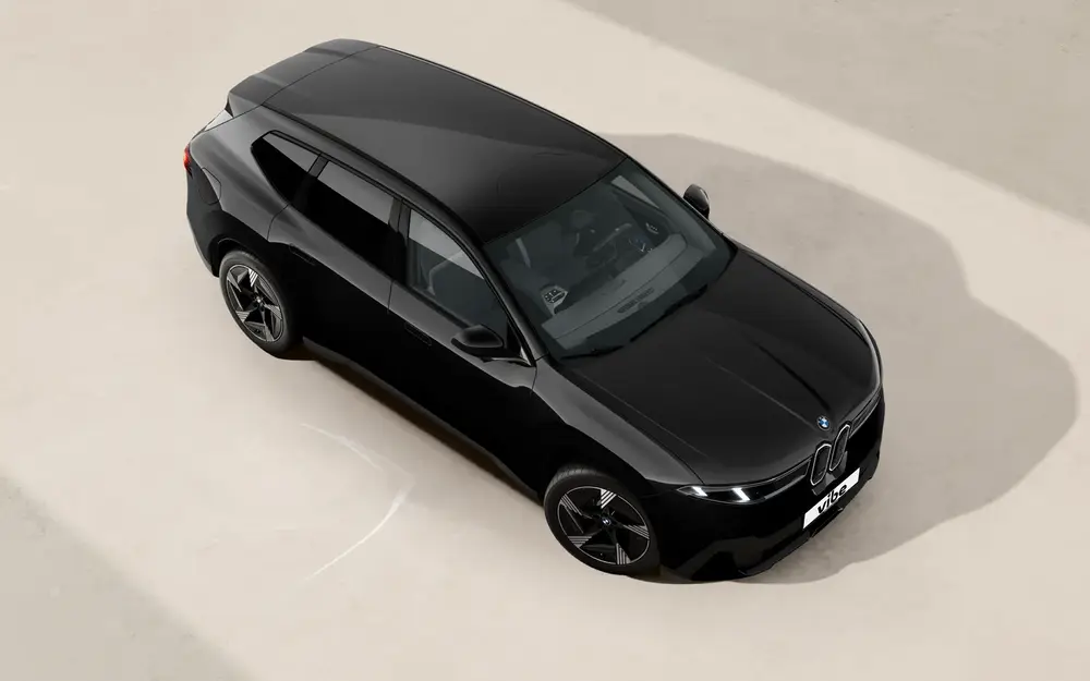 Schwarzer BMW iX3 neue Klasse mit vibe Kennzeichen.