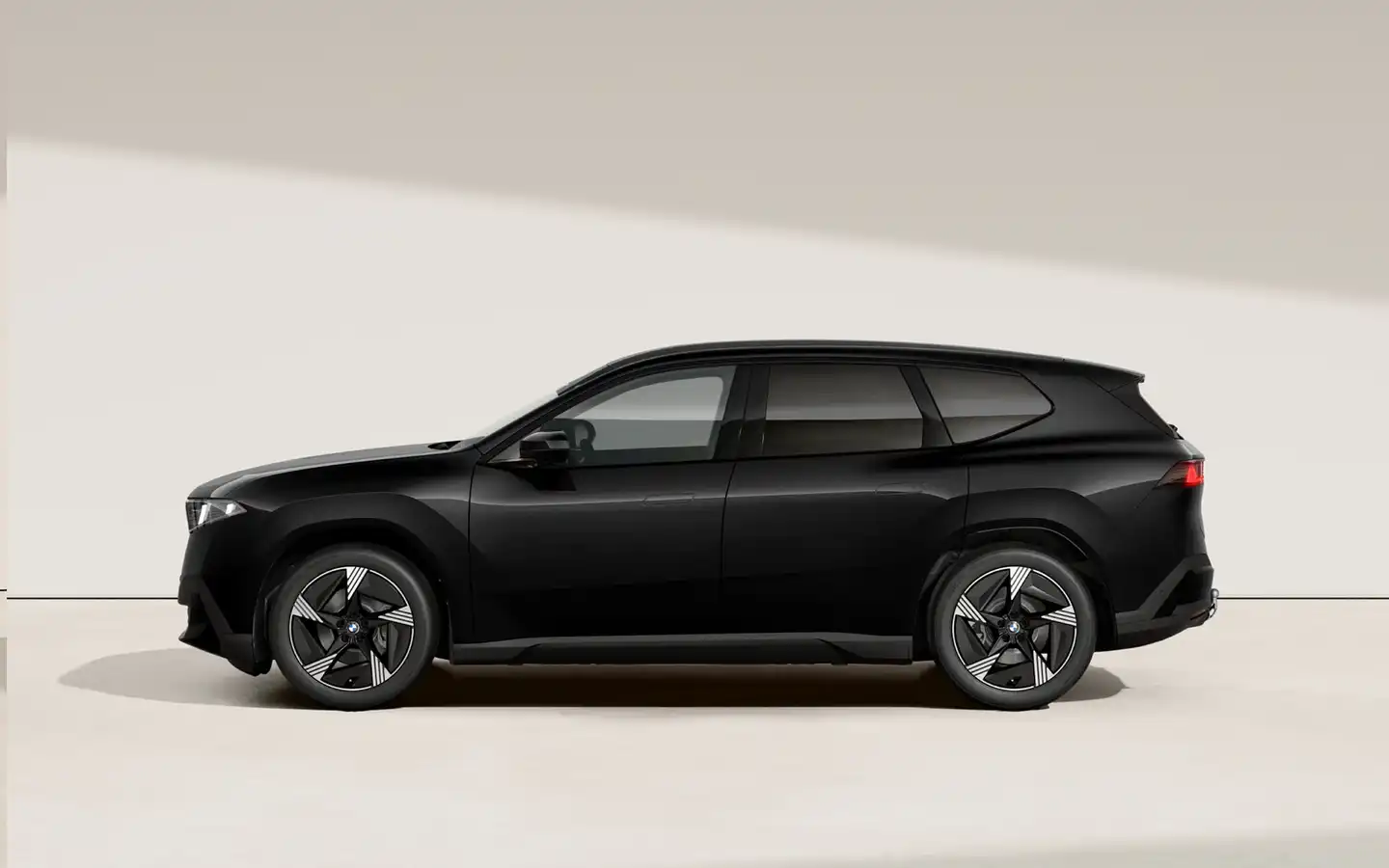 Schwarzer BMW iX3 neue Klasse mit vibe Kennzeichen.