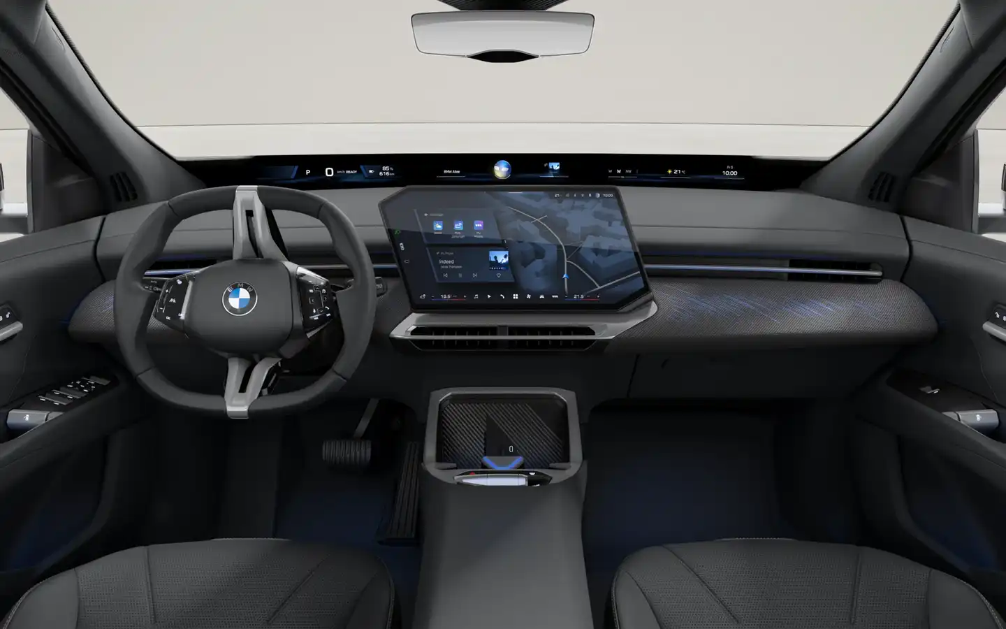 Cockpit des BMW iX3 Neue Klasse mit modernem Lenkrad, großem zentralen Touchscreen, digitalem Displayband über die gesamte Armaturentafel und minimalistischer Innenraumgestaltung.